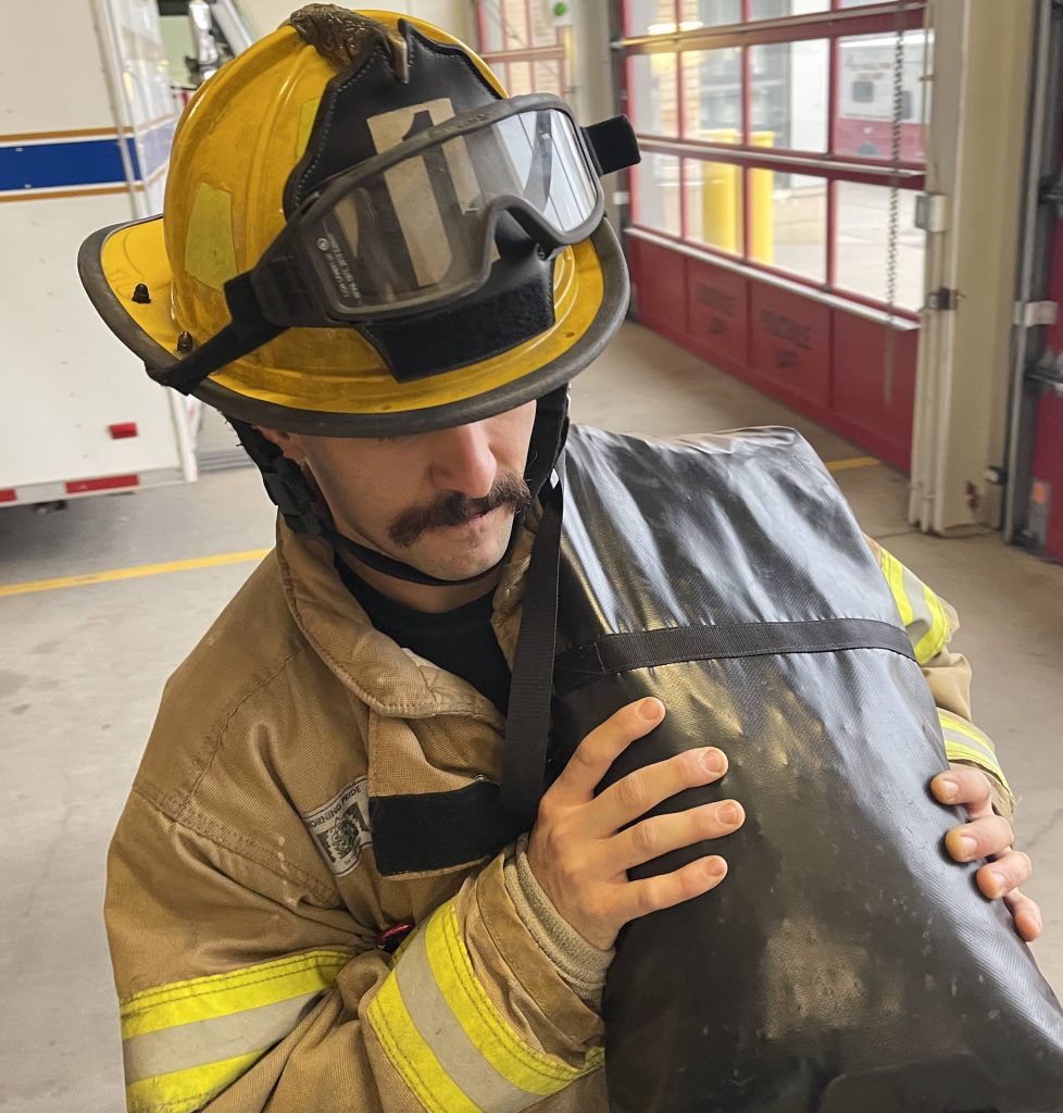 Firefighter Stair Climb Hose Bundle Carry